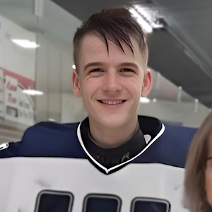 Child Care Testimonials - a young man in hockey jersey